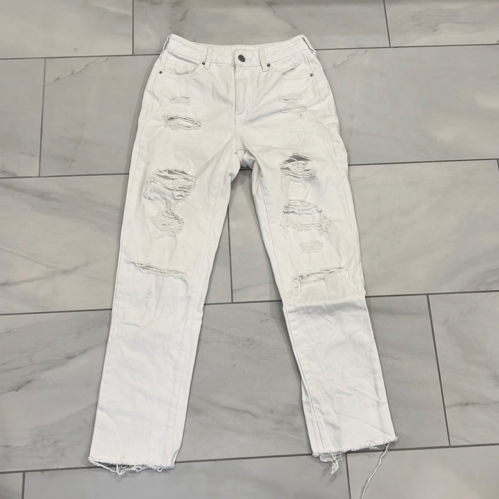 Disctressed white denim